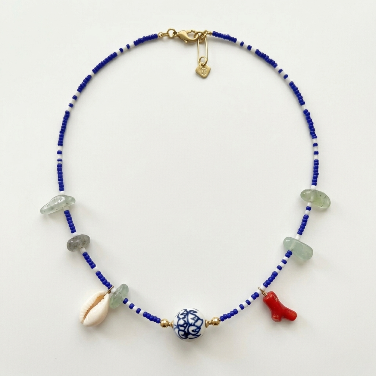 Royal Blue & White Beaded Charm Necklace - Chinoiserie Ceramic Bead, Red Coral, and Cowrie Shell - Handmade Boho Statement Jewelry